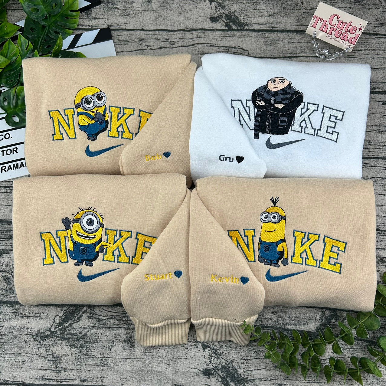 Minionai su Vadovu siuvinėti džemperiai